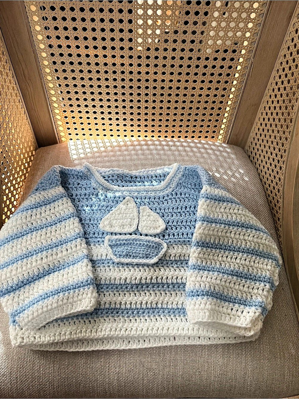 Handmade crochet baby sweater